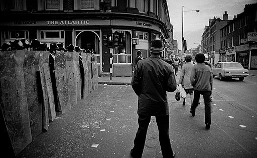 Image of police officer at Brixton Riots, 1981.