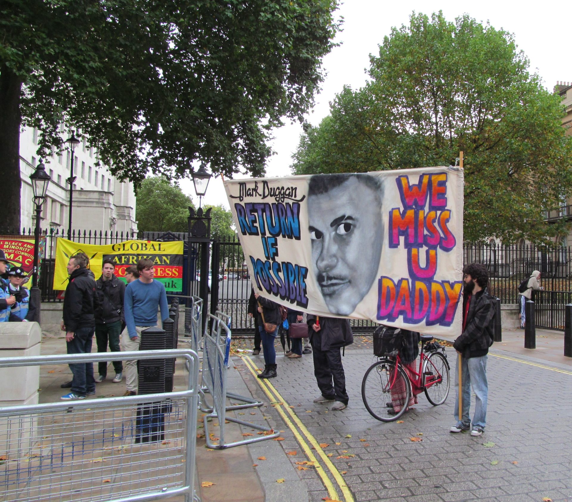 Images of protesters campaigning about Mark Duggan's death.